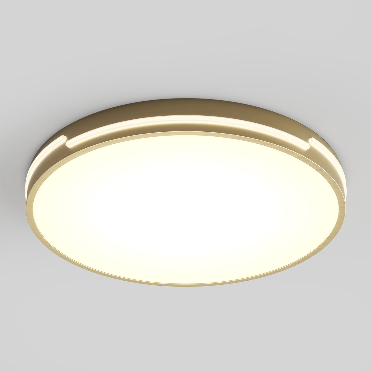 A modern, round ceiling light fixture with a warm, glowing white center and a beige outer rim, mounted against a plain light gray ceiling.