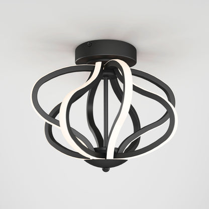 The Artika Meridian LED flush mount light features black, looped metal bands and integrated LED strips in an abstract, spherical design, creating a modern look against a plain white ceiling.