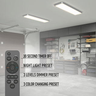 A modern garage features the Artika Europa 48 LED flush mount light, with shelves and tools. A remote in the foreground shows timer, night light, dimmer, and color changing options—highlighting the Europa’s smart lighting control.