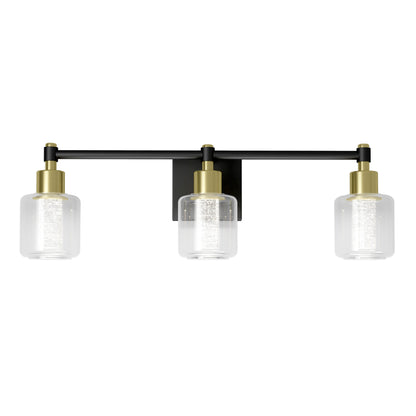 The Artika Champagne Globe bathroom vanity light is a modern wall-mounted fixture with three clear glass shades, gold-toned sockets, and a black metal base and horizontal bar.