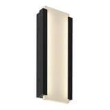 A modern wall sconce with a rectangular frosted white center panel, framed by two black vertical side panels, emitting a soft, even light.