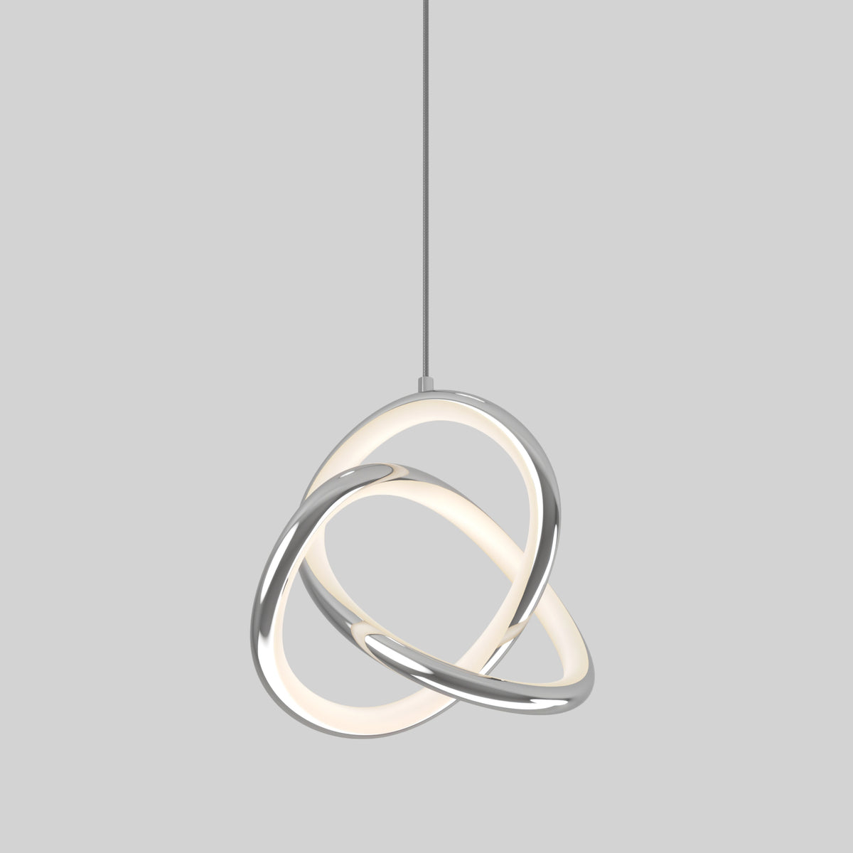 A modern pendant light featuring two interlocking rings, one emitting a soft white glow and the other metallic, suspended from a single cord against a plain grey background.