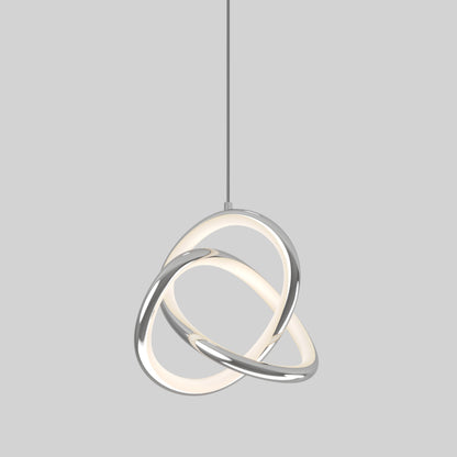 The Artika Zephyr LED pendant features two interlocking oval rings—one glowing white, one metallic silver—suspended from a slim cord against a plain gray background.