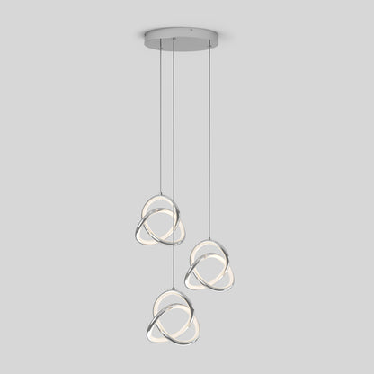 The Artika Zephyr 3-light LED pendant features three intertwined circular loops with integrated LED strips, suspended from a round ceiling plate. This dimmable modern chandelier adds style and elegance to any room.