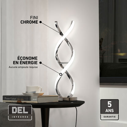 Artika Swirl LED table lamp delivers ambient light on a side table by a window; includes 5-year warranty.