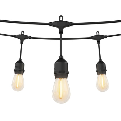 Artika Blaze 20 LED Outdoor Solar String Lights feature black sockets with glowing vintage-style Edison bulbs on a black cable, shown against a plain white background.