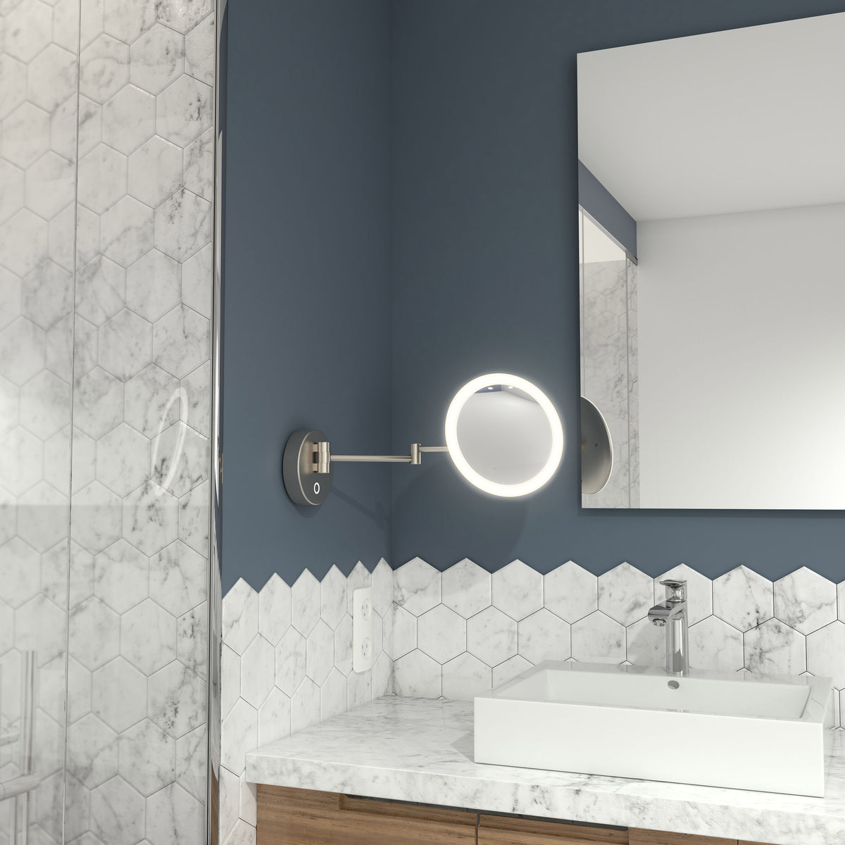 A modern bathroom with a blue wall, hex tile, marble top, and Artika Radia 9 in. LED Cosmetic Mirror above the square sink.