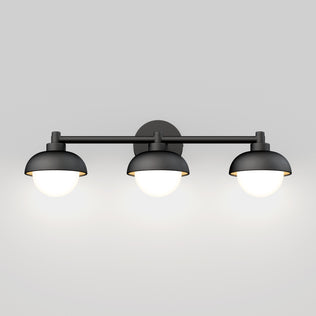 The Artika Boden 27-in Integrated LED 5-CCT Vanity Light Bar features a modern black finish and sleek design, casting a soft, warm white glow—ideal for contemporary bathrooms.