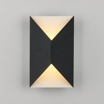 The Artika Tria LED indoor-outdoor wall light features a modern black geometric design, emitting soft, warm light from the top and bottom against a light gray wall.