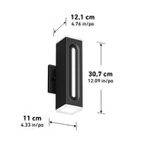A black rectangular wall light fixture with a vertical frosted section, measuring 30.7 cm tall, 12.1 cm deep, and 11 cm wide. Dimensions are labeled in both centimeters and inches.