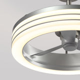 Close-up of a modern ceiling fan with three blades and a circular LED light ring, featuring a sleek, metallic design against a plain, light gray background.