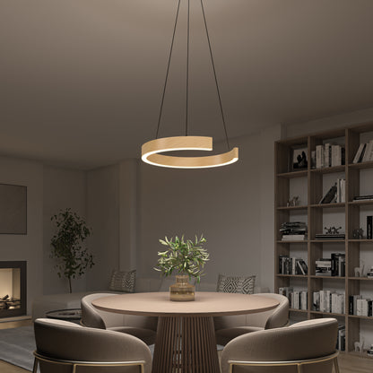 A modern dining room with a circular wooden table, four upholstered chairs, a potted plant centerpiece, built-in bookshelves in the background, and an Artika Vance modern LED pendant light 3 CCT hanging above.