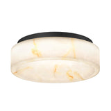 Round ceiling light fixture with a black base and a white, marble-patterned glass shade featuring subtle yellow and brown veining.
