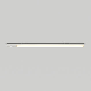 The Artika Outline under cabinet LED light 3CCT is mounted horizontally on a plain light gray ceiling, providing a modern look and emitting a soft, even glow.