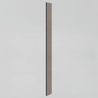 The Artika Sonolok sound-absorbing wall panel kit features a single vertical wooden slat with evenly spaced narrow grooves, displayed against a plain light gray background.