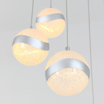 The Artika Wavey 5-light LED pendant features textured, glowing glass shades with diagonal metallic bands, suspended from the ceiling against a plain light background.