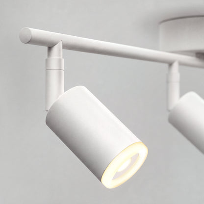Close-up of Artika Asher 32 in. 4-Light LED Track Light 3CCT, featuring adjustable cylindrical spotlights on a light grey background.