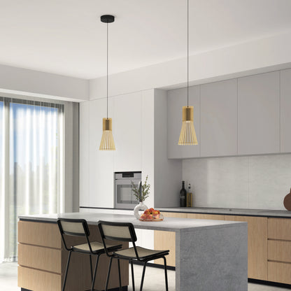 Modern kitchen featuring light wood cabinets, a gray island with two black chairs, and two Artika Kiyo modern LED pendant 3 CCT lights. Large window with sheer curtains brings in natural light. Fruit bowl and vase on the island enhance the minimalist look.