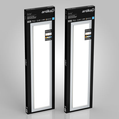 Two rectangular Artika Sunray ultra thin LED light panel 3 CCT boxes are shown upright in black packaging with white accents, product information, and a display window revealing the lights inside.