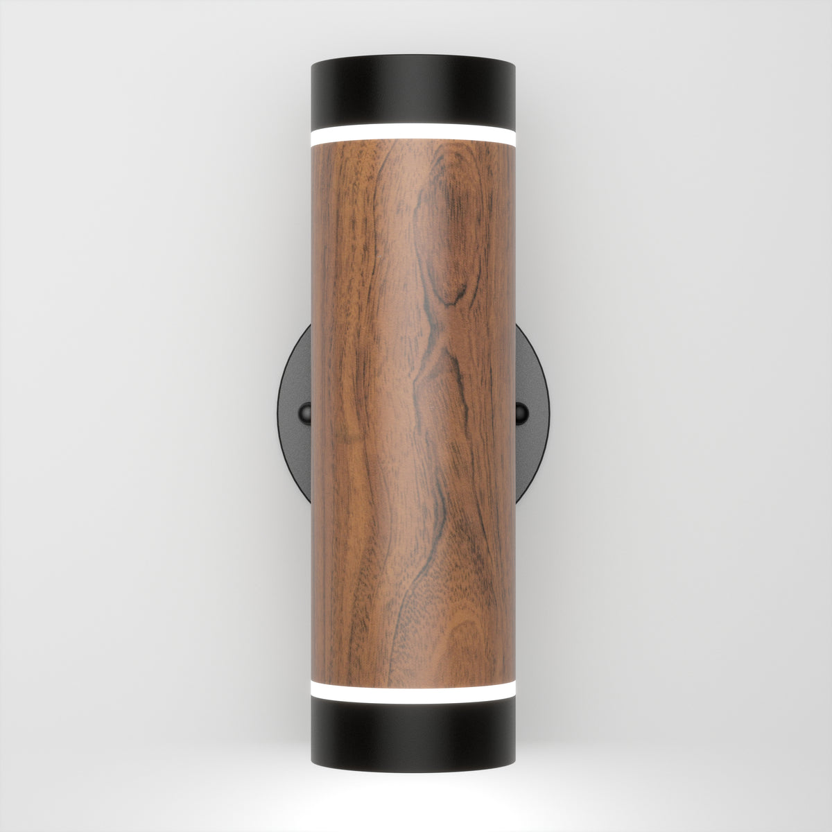 A modern wall sconce with a cylindrical wood finish body, black metal top and bottom edges, and white LED light strips at both ends, mounted on a circular black wall plate.