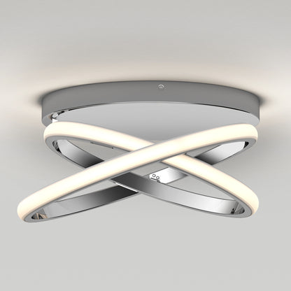 The Orbia modern LED flush mount light 3 CCT by Artika features two interlocking curved LED strips and a polished chrome finish, mounted on a round chrome base against a white ceiling.