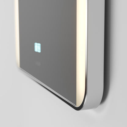 A close-up of the Artika Onyx LED Mirror with Defogger and 3CCT, featuring a chrome finish on a light wall.