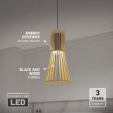 A modern pendant light with a black and wood finish hangs over a kitchen counter. Text highlights its energy efficiency, integrated LED, no bulbs required, and a 3-year warranty.