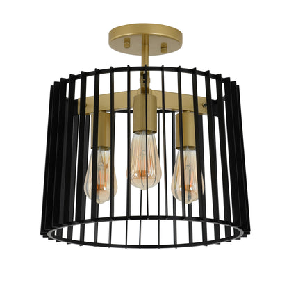 The Artika Gatsby flush mount light is a modern semi-flush fixture with three exposed vintage bulbs, a round gold base, and a black cylindrical metal cage-style shade.