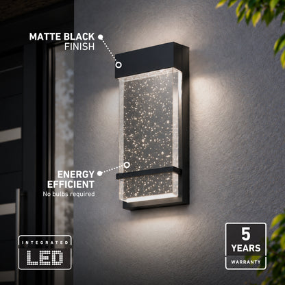 Artika Skyler indoor-outdoor LED wall light: rectangular matte black frame with bubble-glass panel, integrated LED, and 5-year warranty.
