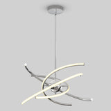 A modern pendant light with a chrome finish, featuring two curved, illuminated LED bars intersecting around a central spherical hub, suspended from the ceiling by a slim rod.