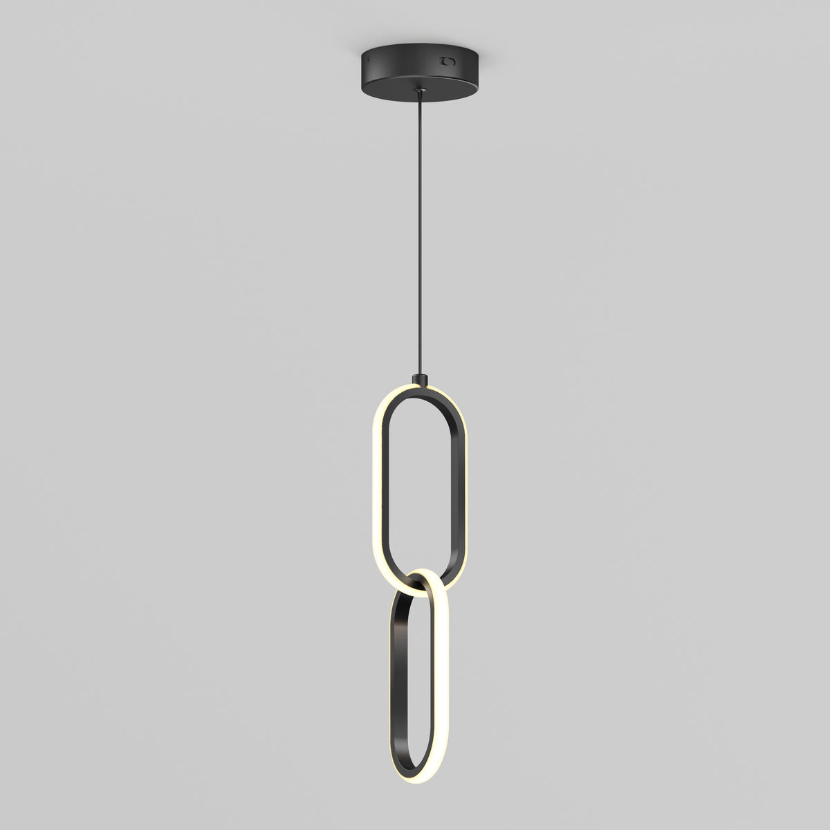 A modern pendant light with two interconnected oval LED rings hanging vertically from a black ceiling mount against a plain light gray background.
