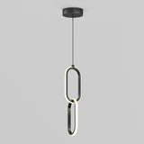 A modern pendant light with two interconnected oval LED rings hanging vertically from a black ceiling mount against a plain light gray background.