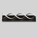 A modern wall light fixture with a black rectangular base and two wavy, intertwined LED light strips mounted on it, against a plain light gray background.