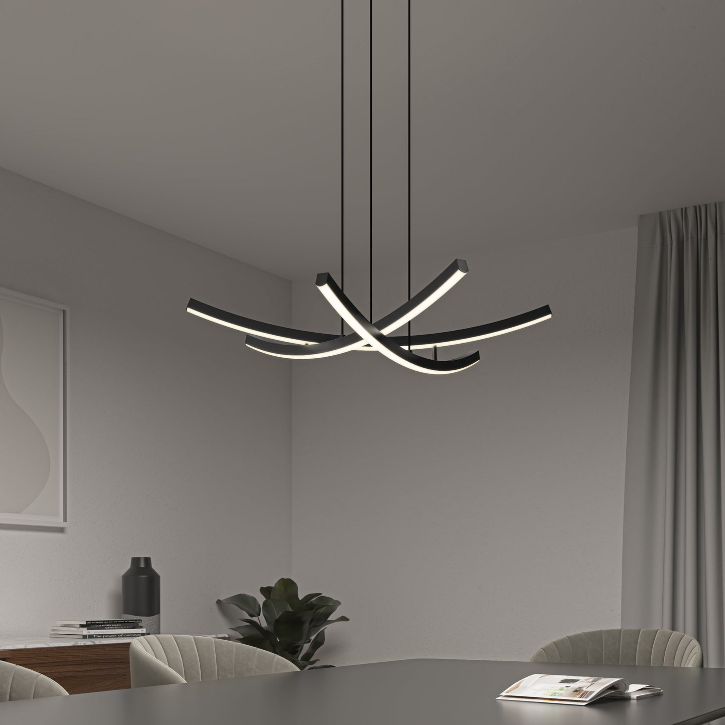 A modern dining room features a black table, gray chairs, a plant, white curtain, framed abstract art, magazine on the table, and the Orly modern LED pendant light 5 CCT by Artika-CAN-dev with curved LED bars.