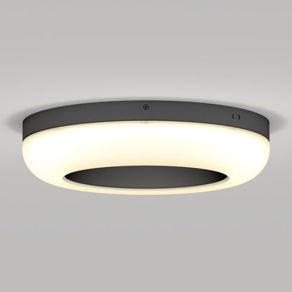The Artika-CAN-dev Louka 15 in. modern LED flush mount light features a black outer ring and edge-glow white diffuser, bringing contemporary elegance to any space. Its 5 CCT settings offer versatile lighting for a light gray ceiling or any room.