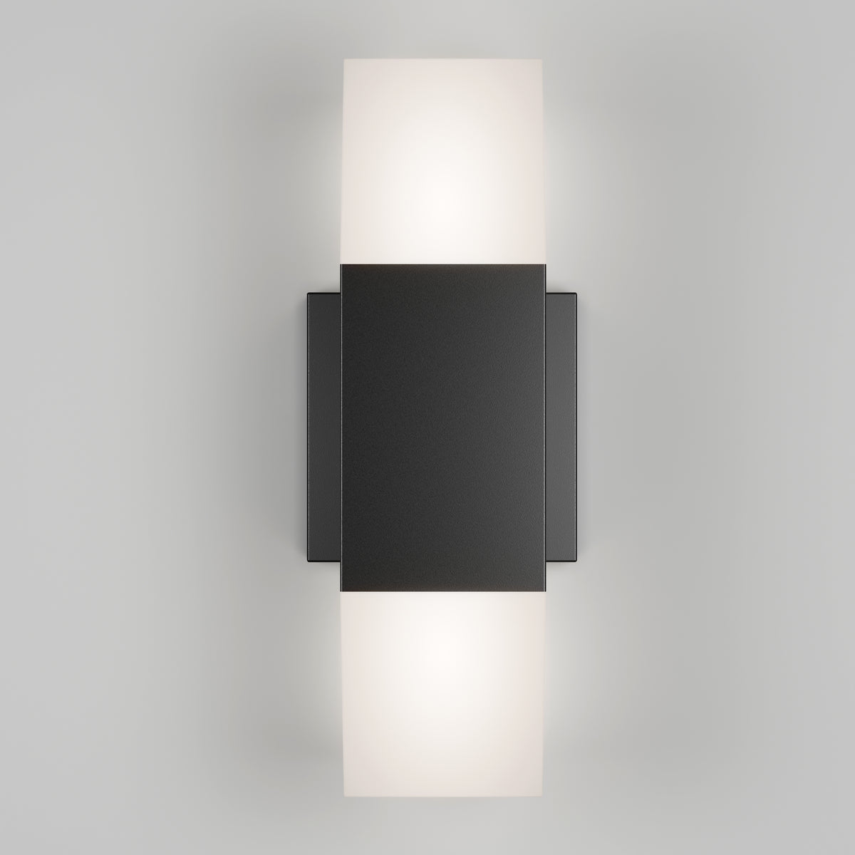 A modern wall sconce with a rectangular black center panel and frosted white diffusers on the top and bottom, emitting soft light upward and downward against a neutral background.