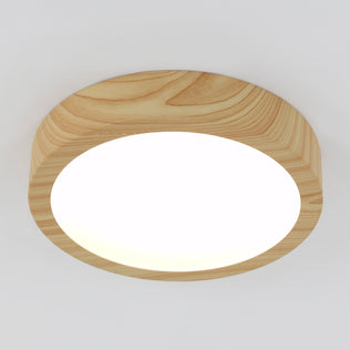 The Artika Dryad 10 in. Modern LED Flush Mount Ceiling Light features a wooden frame and white center for a sleek, minimalist look.