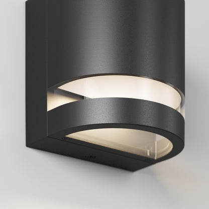 A close-up of Artika’s Valor Round LED indoor-outdoor wall light shows its curved design and bright integrated LED.