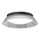 A modern ceiling light fixture with a black circular base and a wide, slightly angled transparent shade, emitting a soft white glow from the center.