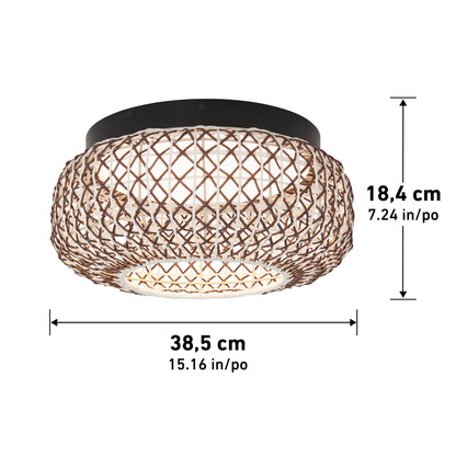 The Artika Benson 15 in. LED flush mount light features a round woven rattan design with a dark frame, measuring 38.5 cm (15.16 in) wide and 18.4 cm (7.24 in) high, as shown with measurement arrows.