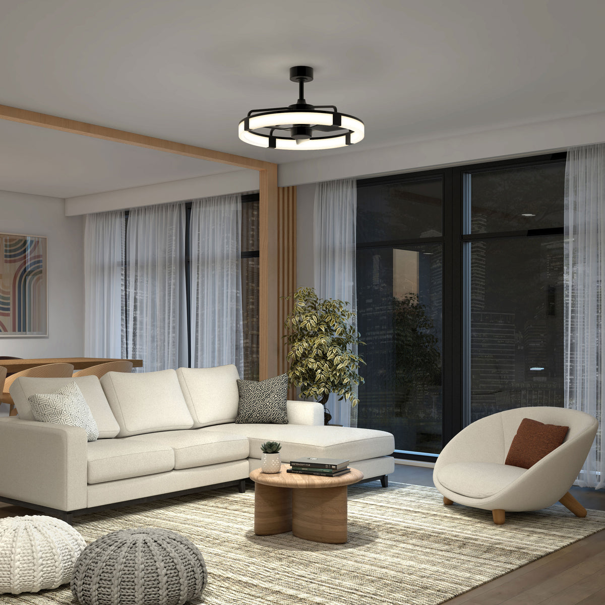 A modern living room features a white sectional sofa, round wooden coffee table, accent chair, large windows with sheer curtains, a potted plant, abstract wall art, and the Artika Sunnyvale 28 in. LED modern ceiling fan with remote control.