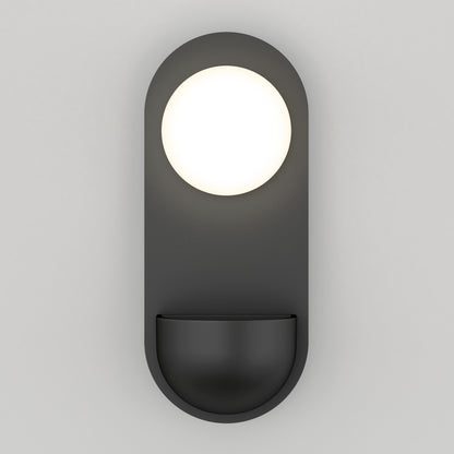 The Artika Bloomfield LED modern mid-century wall sconce 5 CCT features a round white light atop a curved dark gray base, shown here against a plain light gray background.