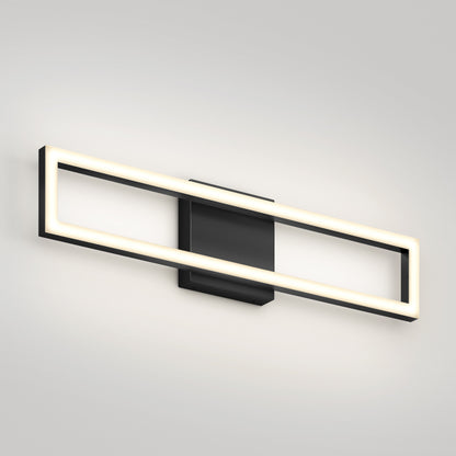 The Artika Dover modern LED bathroom vanity light 5 CCT features a rectangular black base and illuminated frame, casting soft white light against a light gray wall for a sleek, contemporary look.