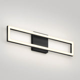 A modern wall-mounted light fixture with a rectangular, open-frame design and integrated LED lighting, featuring a black base and a glowing rectangular outline emitting soft white light.