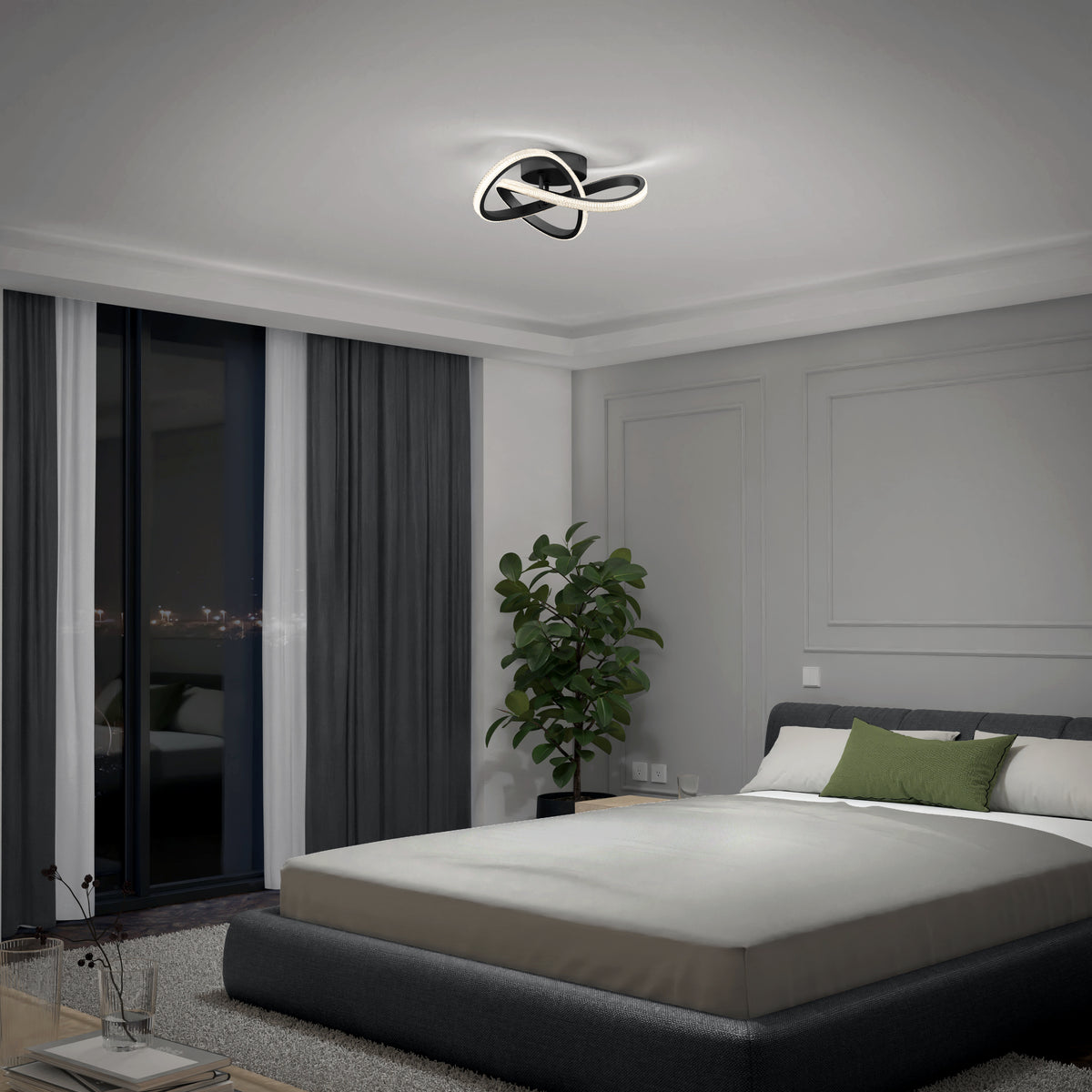 A modern bedroom with a large bed, gray and white bedding, green accent pillows, a potted plant, floor-to-ceiling windows with city view, and a contemporary ceiling light fixture.