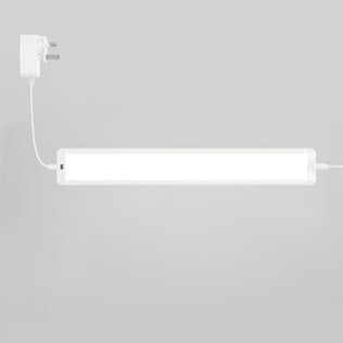 The Artika Maestro under cabinet LED light 3 CCT (3-pack) is plugged in and mounted on a light gray wall for kitchen lighting.