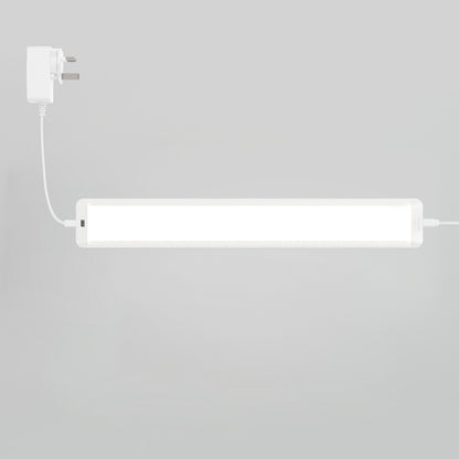 The Artika Maestro under cabinet LED light 3 CCT (3-pack) is plugged in and mounted on a light gray wall for kitchen lighting.