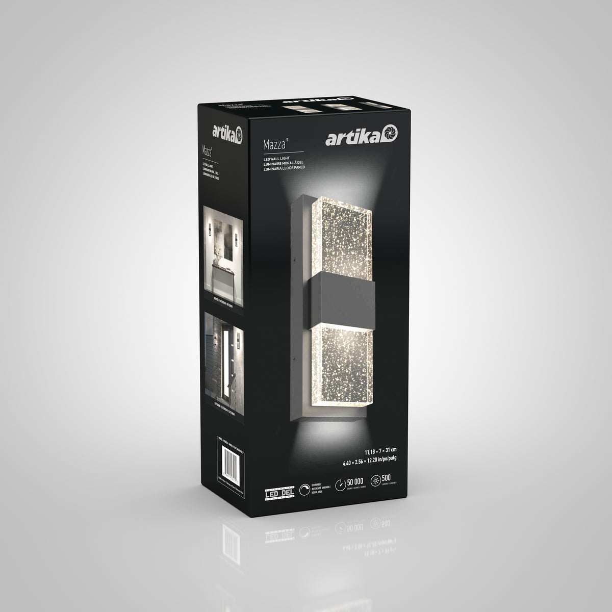 A box of an Artika Mazza LED wall light, featuring an image of the light fixture with a sparkling design on the front, product details, and installation illustrations on the side. The box is shown on a plain background.