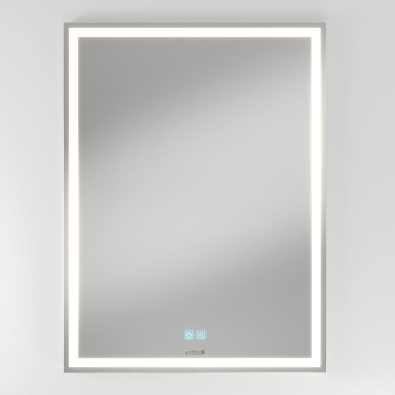 Artika Aurea 24″x31″ anti-fog LED bathroom mirror with touch buttons, mounted on a white wall.