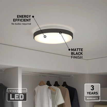 The Artika Sunraker 10 in. LED modern flush mount ceiling light features a matte black finish, energy-efficient integrated LED (no bulbs required), and a 3-year warranty—perfect for closets with clothes hanging below.